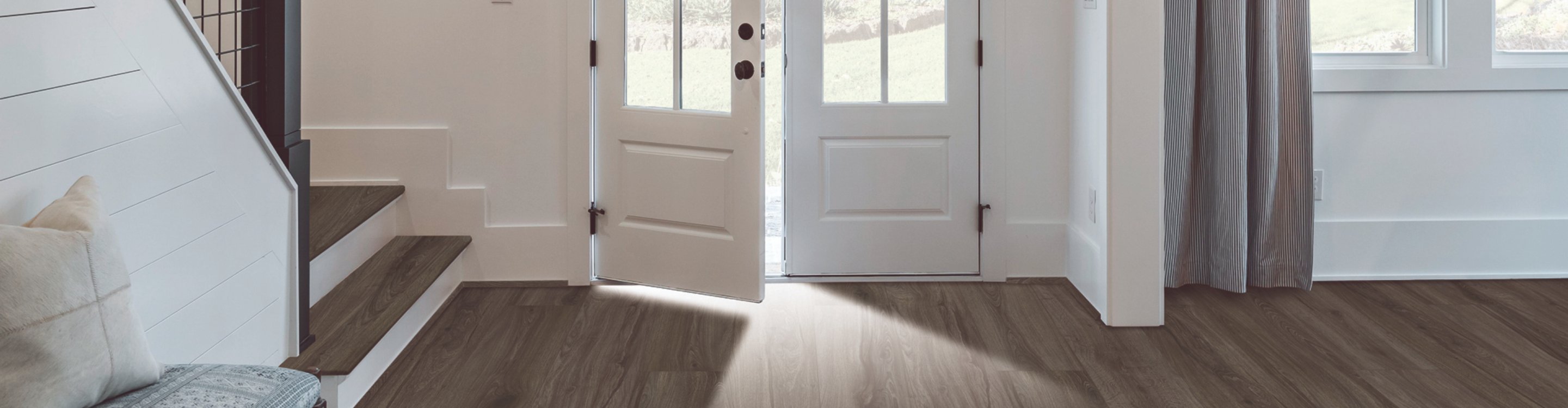 wood look luxury vinyl floors in an entryway